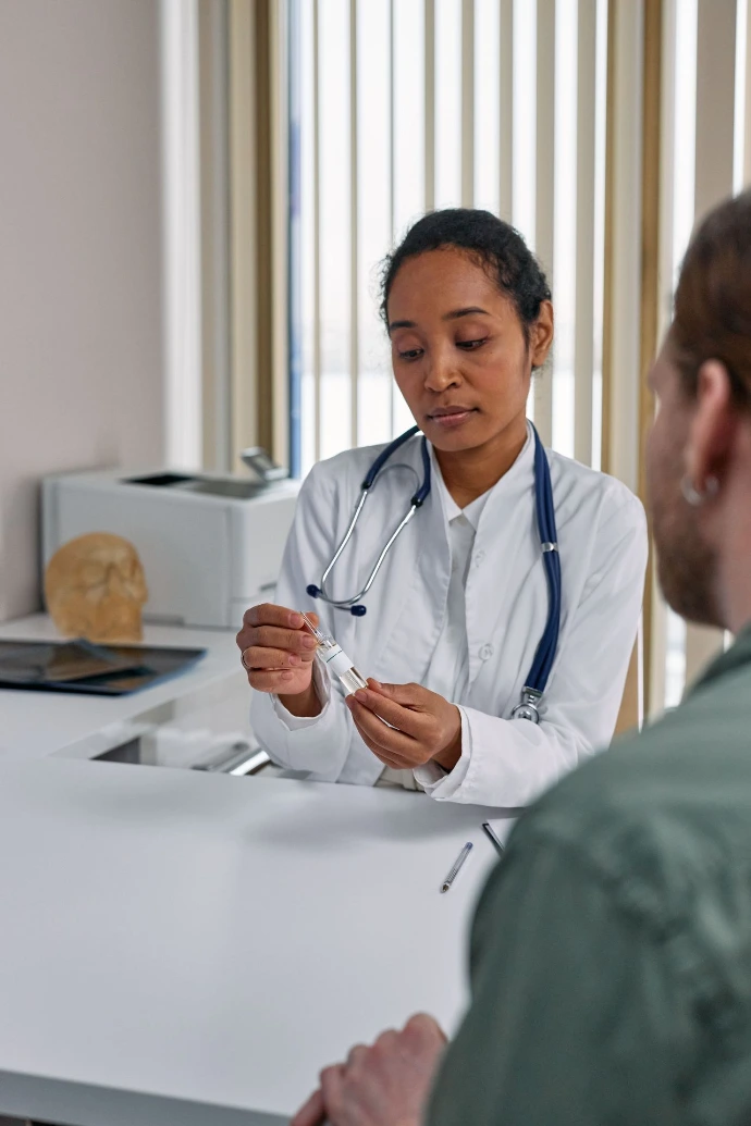 Physician examining a patient